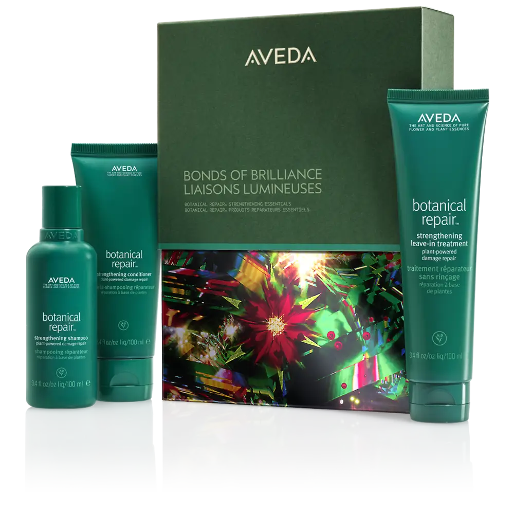 Aveda Bonds of Brilliance gift set featuring botanical repair shampoo, conditioner, and leave-in treatment in green packaging—perfect for holiday event hair or fall winter hair style tips. - Get Panache, FL